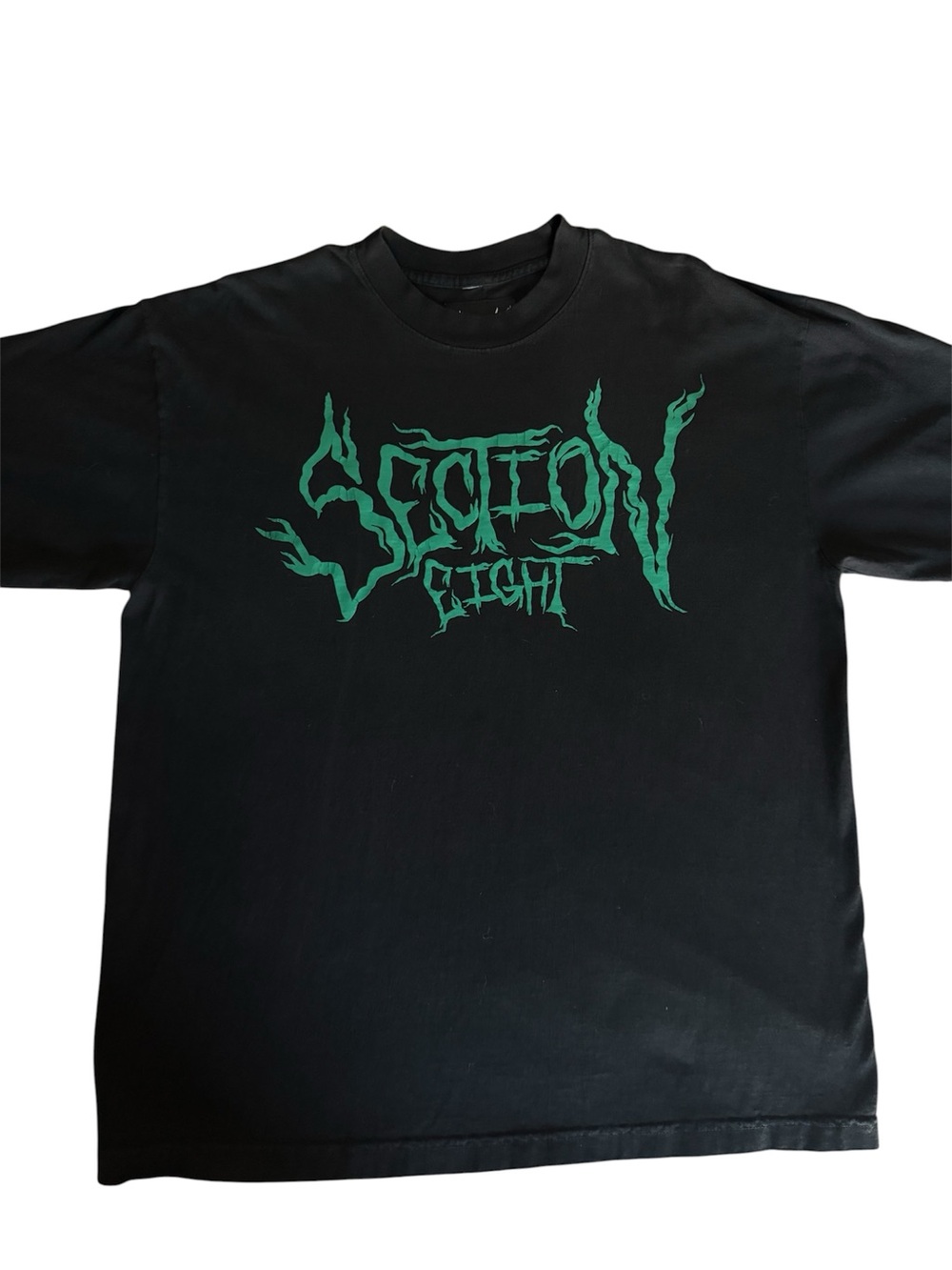 Black Short-Sleeve Tee with Green Graphic Logo